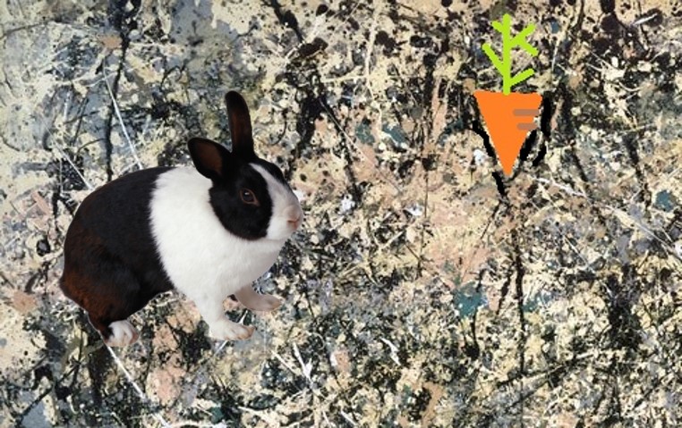 Close-up de Lavender mist. A la izquierda, un conejito blanco y negro. A la derecha, un dibujo de una zanahoria entre dos líneas negras (parte de la pintura), que la encierran.